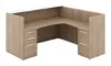 L shaped reception desk with white glass transaction counter