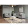 upholstered club chair with light gray fabric