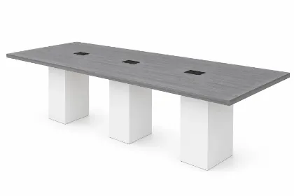Cafe height conference table with white cube bases, laminate top, and wire management grommets