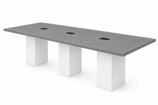 Cafe height conference table with white cube bases, laminate top, and wire management grommets