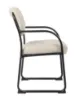 Boss beige LeatherPlus guest chair with curved arms, contoured cushions, black steel sled base, and reception seating design