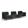 Saxon 3-seat modular reception sofa with tall arms, two connector tables, built-in power outlets, soft cushioning, and upholstery options