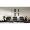 Saxon 3-seat modular reception sofa with tall arms, two connector tables, built-in power outlets, soft cushioning, and upholstery options