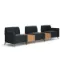 Saxon 3-seat modular reception sofa with tall arms, two connector tables, built-in power outlets, soft cushioning, and upholstery options