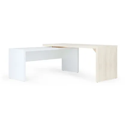 Modern L-shaped executive desk with reversible return, commercial laminate work surface, metal legs, and contemporary two-tone finish.