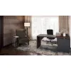 Modern L-shaped executive desk with reversible return, commercial laminate work surface, metal legs, and contemporary two-tone finish.