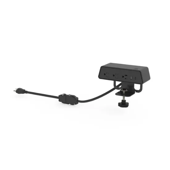 Desktop power module with integrated wireless phone charger, three AC outlets, USB-A, USB-C ports, and C-clamp mounting for office desks and conference tables.