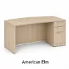 66-inch bow front executive desk with integrated 3 drawer pedestal in commercial laminate for executive and professional offices.
