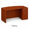66-inch bow front executive desk with integrated 3 drawer pedestal in commercial laminate for executive and professional offices.