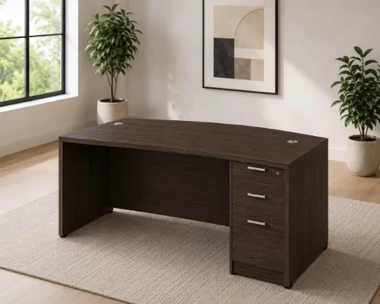 	66-inch bow front executive desk with integrated 3 drawer pedestal in commercial laminate for executive and professional offices.