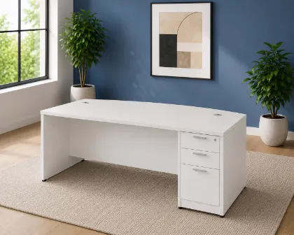 66-inch bow front executive desk with integrated 3 drawer pedestal in commercial laminate for executive and professional offices.