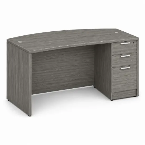 66-inch bow front executive desk with integrated 3 drawer pedestal in commercial laminate for executive and professional offices.