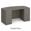 71-inch bow front executive desk with built-in drawers in commercial laminate for executive and professional office spaces.