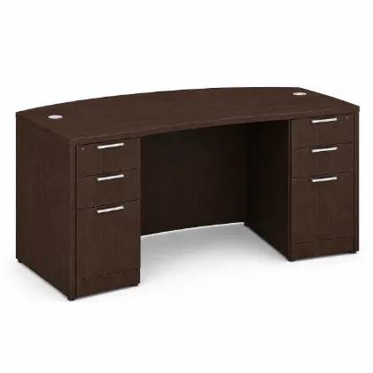 71-inch bow front executive desk with built-in drawers in commercial laminate for executive and professional office spaces.