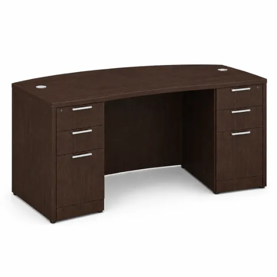 71-inch bow front executive desk with built-in drawers in commercial laminate for executive and professional office spaces.