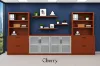 142-inch executive office storage wall with locking lateral file cabinets, open bookcases, and frosted glass door credenza in a commercial executive office