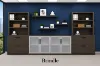142-inch executive office storage wall with locking lateral file cabinets, open bookcases, and frosted glass door credenza in a commercial executive office