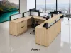 Commercial U-shaped reception desk with elevated transaction counter, frosted acrylic privacy panels, integrated storage, and modern laminate finish.