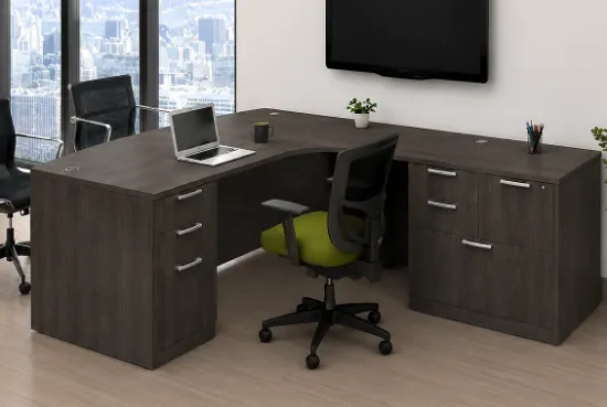 Bow Front Executive L-Shaped Desk with locking file drawers in a modern commercial office.