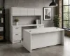 71-inch executive bow front desk with matching storage credenza, overhead hutch, and locking file drawers in a modern executive office.
