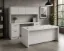 71-inch executive bow front desk with matching storage credenza, overhead hutch, and locking file drawers in a modern executive office.