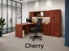 	Executive L-shaped office suite featuring a bow front desk, overhead hutch, wardrobe storage cabinet, locking file drawers, and commercial laminate construction.