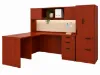 Executive L-shaped office suite featuring a bow front desk, overhead hutch, wardrobe storage cabinet, locking file drawers, and commercial laminate construction.