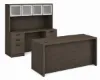 	71-inch executive desk with matching storage credenza, glass door hutch, and locking file drawers in a modern executive office.
