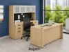 	71-inch executive desk with matching storage credenza, glass door hutch, and locking file drawers in a modern executive office.