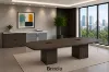 10-foot executive conference table with matching storage credenza featuring glass doors in a modern boardroom.