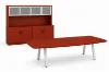 Modern executive conference table with powder-coated metal legs and matching storage credenza featuring a glass door hutch in a professional boardroom.