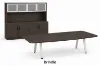 Modern executive conference table with powder-coated metal legs and matching storage credenza featuring a glass door hutch in a professional boardroom.