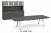 Modern executive conference table with powder-coated metal legs and matching storage credenza featuring a glass door hutch in a professional boardroom.