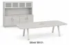 Modern executive conference table with powder-coated metal legs and matching storage credenza featuring a glass door hutch in a professional boardroom.