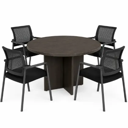 Round conference table with mesh back chairs for office meeting rooms