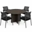 Round conference table with mesh back chairs for office meeting rooms