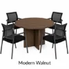 Round conference table with mesh back chairs for office meeting rooms