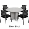 Round conference table with mesh back chairs for office meeting rooms