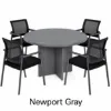 Round conference table with mesh back chairs for office meeting rooms