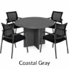 Round conference table with mesh back chairs for office meeting rooms