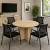 Round conference table with mesh back chairs for office meeting rooms
