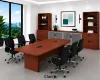 Executive boardroom furniture suite with boat-shaped conference table, upholstered conference chairs, and 142-inch executive storage wall