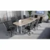 Modern conference room furniture set with boat shaped conference table, locking storage credenza, and black leather conference chairs.