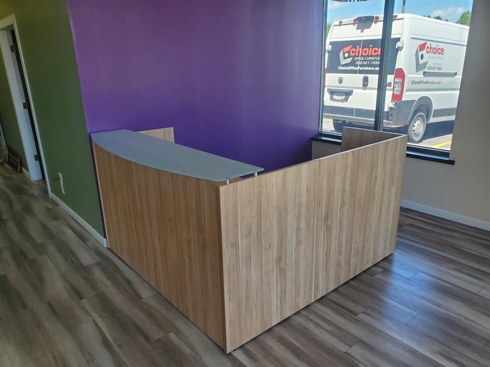 Professional commercial office furniture installation with executive desks, workstations, conference furniture, and storage being assembled in a modern office.