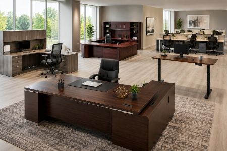 Small business office with space-saving desks, ergonomic chairs and storage